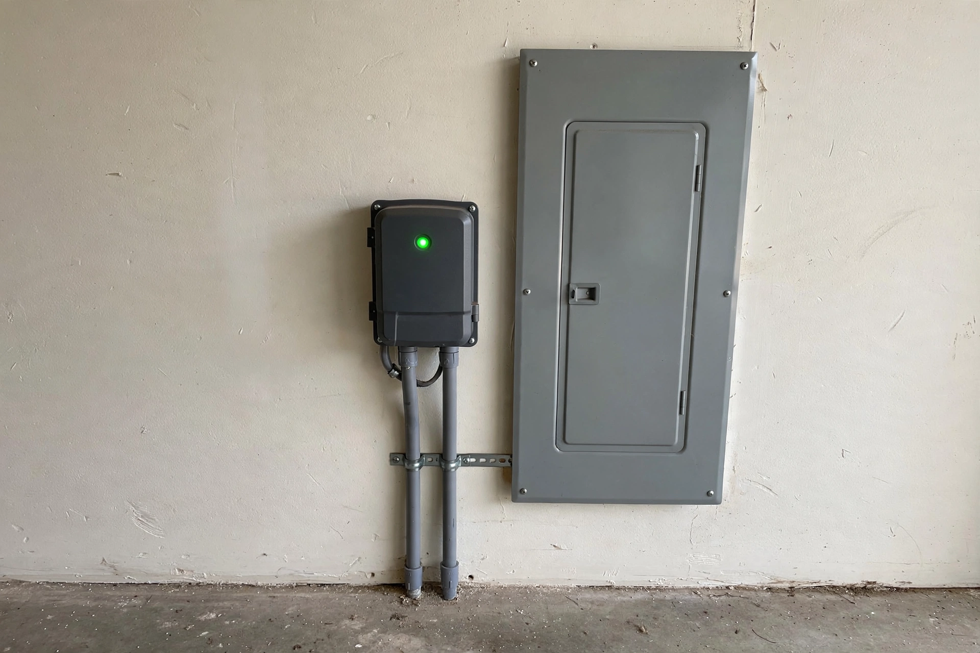 Whole home surge protection device mounted next to a breaker panel